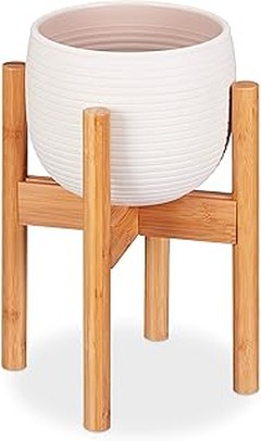 Inspírate con Estas Ideas de Jardinería Usando Macetas de Madera con Patas